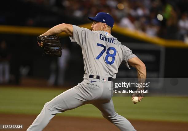 Michael Grove of the Los Angeles Dodgers delivers a pitch against the Arizona Diamondbacks during Game Three of the Division Series at Chase Field on...