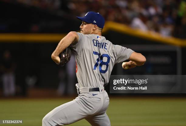 Michael Grove of the Los Angeles Dodgers delivers a pitch against the Arizona Diamondbacks during Game Three of the Division Series at Chase Field on...