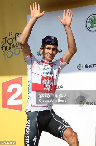 Michal Kwiatkowski of Poland and Omega Parma-Quick Step takes the best youger's white jersey after Stage Eleven of the Tour de France 2013 - the...