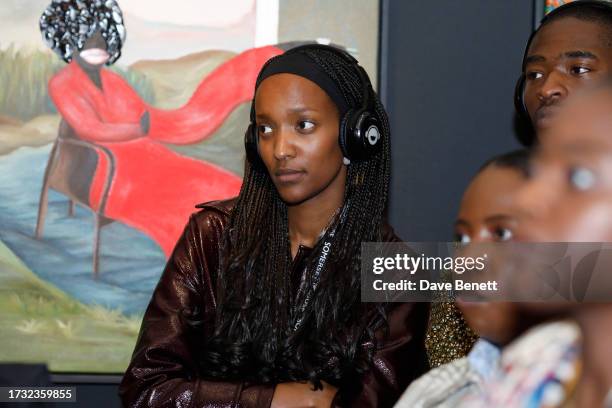 Guest attends Mr Eazi's "The Evil Genius" Art And Music Experience 1-54 London at Somerset House on October 12, 2023 in London, England.