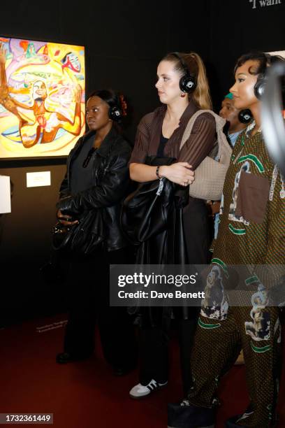 Temiloluwa Otedola and guests attend Mr Eazi's "The Evil Genius" Art And Music Experience 1-54 London at Somerset House on October 12, 2023 in...