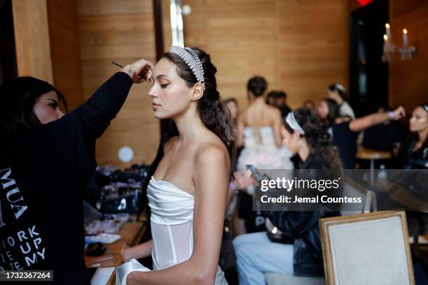 Model backstage during Bronx And Banco Bridal NYFW "La Blanche" at Baccarat Hotel on October 12, 2023 in New York City.