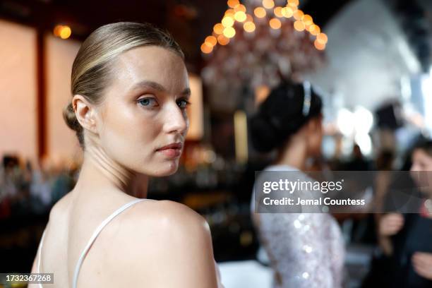 Model backstage during Bronx And Banco Bridal NYFW "La Blanche" at Baccarat Hotel on October 12, 2023 in New York City.