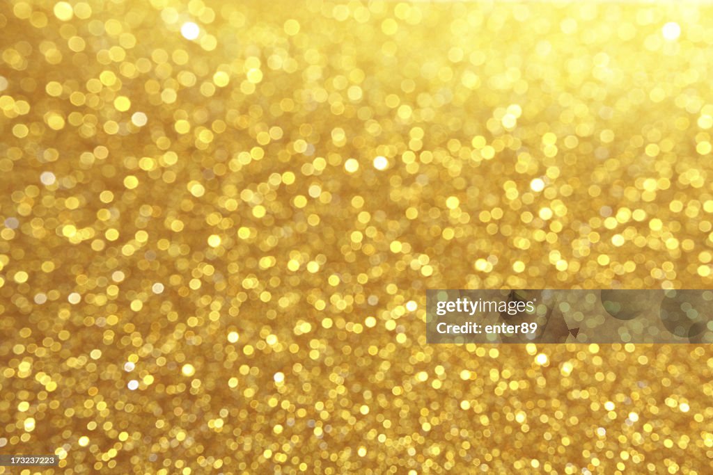 Glitter in gold coloration