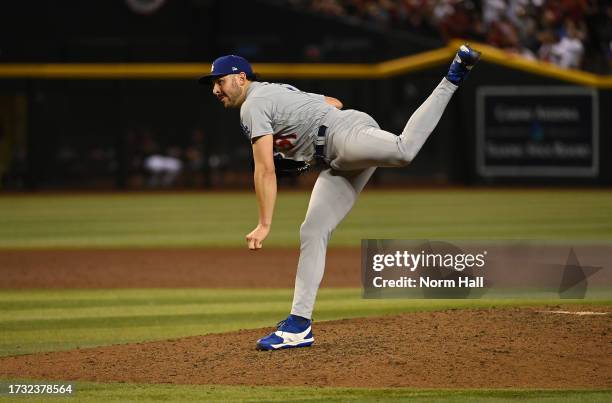 Alex Vesia of the Los Angeles Dodgers delivers a pitch against the Arizona Diamondbacks during Game Three of the Division Series at Chase Field on...