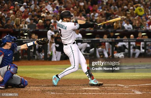 Evan Longoria of the Arizona Diamondbacks follows through on a swing against the Los Angeles Dodgers during Game Three of the Division Series at...