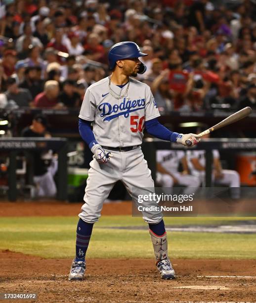 Mookie Betts of the Los Angeles Dodgers gets ready in the batters box against the Arizona Diamondbacks during Game Three of the Division Series at...