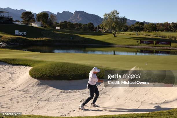 Luke List of the United States plays a shot from a bunker on the 17th hole during the first round of the Shriners Children's Open at TPC Summerlin on...
