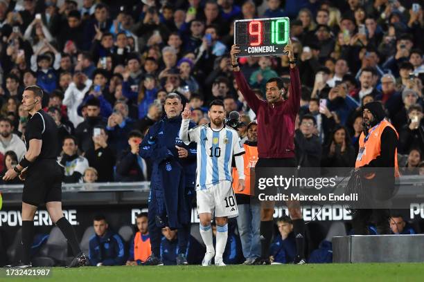 Lionel Messi of Argentina substitutes teammate Julian Alvarez during the FIFA World Cup 2026 Qualifier match between Argentina and Paraguay at...