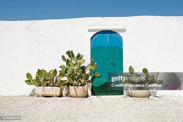 doorway in ostuni, puglia italy - mediterranean culture stock pictures, royalty-free photos & images