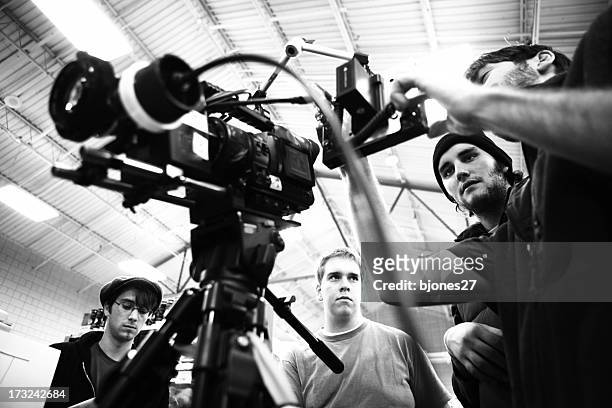 film crew - film director stock pictures, royalty-free photos & images