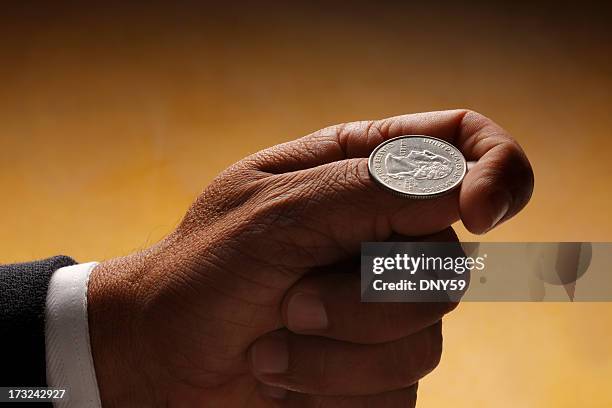 coin flip - coin toss stockfoto's en -beelden