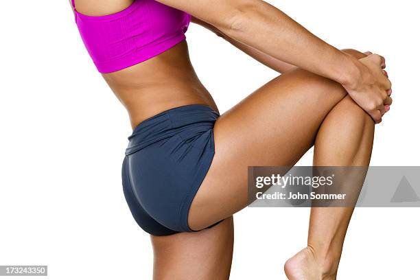 fitness woman stretching - ladies shorts stock pictures, royalty-free photos & images