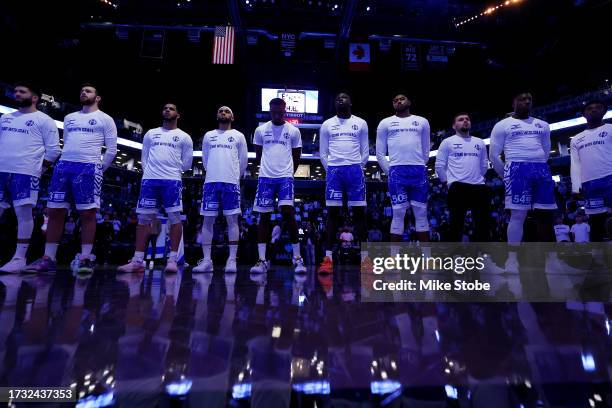 Maccabi Ra'anana stands during the national anthem prior to an exhibition game against the Brooklyn Nets at Barclays Center on October 12, 2023 in...