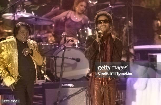 June 25: James Brown, Cindy Blackman Santana and Lenny Kravitz performing on June 25th, 2000 in New York City.
