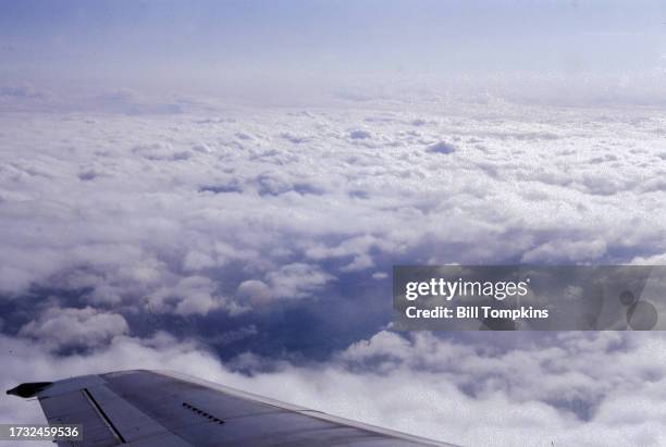 Mediterranean Sea, Italy Airplane wing over the clouds on May 3rd, 1987.