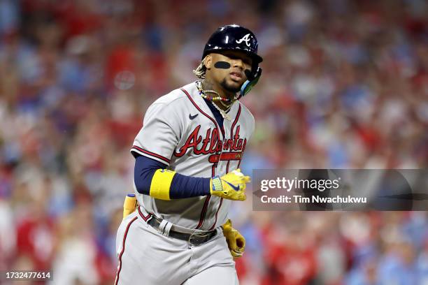 Ronald Acuna Jr. #13 of the Atlanta Braves reacts to grounding out in the third inning against the Philadelphia Phillies during Game Four of the...