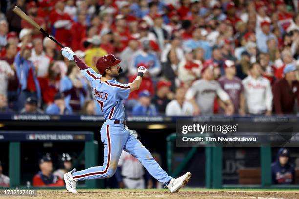 Trea Turner of the Philadelphia Phillies hits a home run in the fifth inning against the Atlanta Braves during Game Four of the Division Series at...