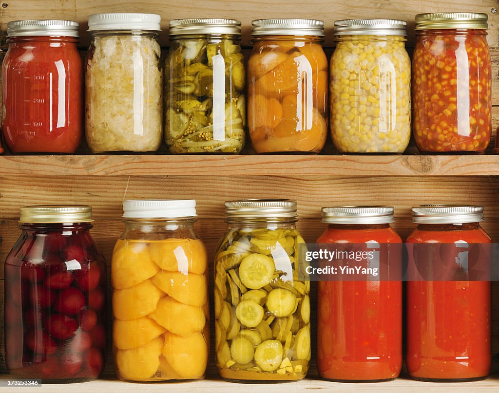 Home Canning of Summer Vegetables on Wooden Shelves Hz