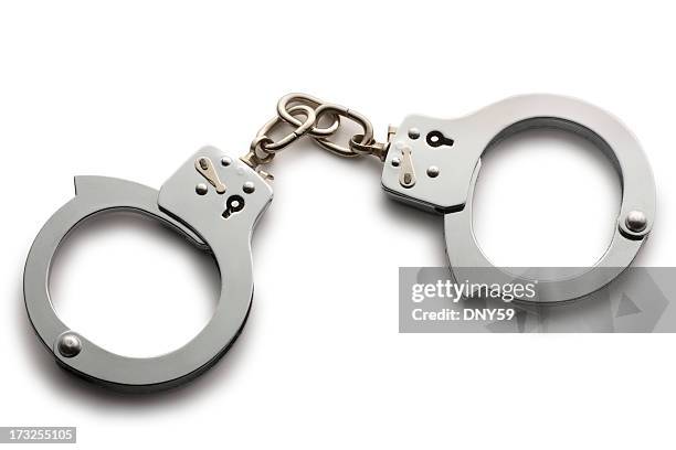 handschelle - handcuffs stock-fotos und bilder