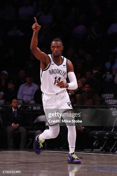 Harry Giles III of the Brooklyn Nets reacts after scoring a basket against Maccabi Ra'anana during an exhibition game at Barclays Center on October...