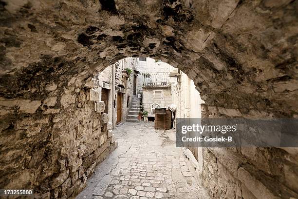 trogir, old street - trogir stock-fotos und bilder