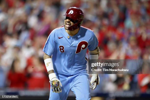 Nick Castellanos of the Philadelphia Phillies reacts after hitting a home run in the sixth inning against the Atlanta Braves during Game Four of the...