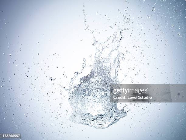 high speed image of water exploding - water splashing stock pictures, royalty-free photos & images