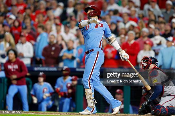 Nick Castellanos of the Philadelphia Phillies hits a home run in the sixth inning against the Atlanta Braves during Game Four of the Division Series...