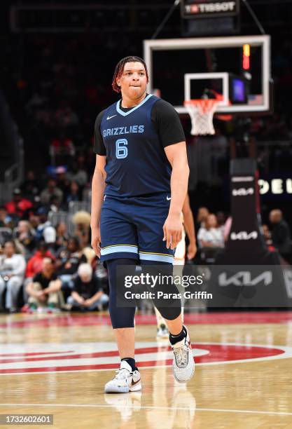 Kenneth Lofton Jr. #6 of the Memphis Grizzlies looks on during a preseason game against the Atlanta Hawks on October 12, 2023 at State Farm Arena in...