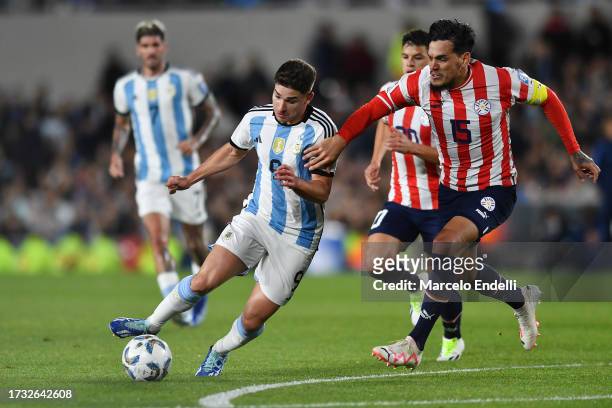 Julian Alvarez of Argentina controls the ball against Gustavo Gomez of Paraguay during the FIFA World Cup 2026 Qualifier match between Argentina and...