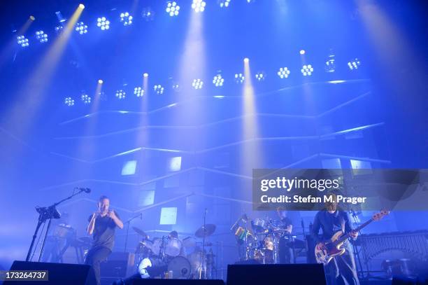 Thom Yorke, Flea, Nigel Godrich, Joey Waronker and Mauro Refosco of Atoms For Peace perform at Zenith on July 10, 2013 in Munich, Germany.