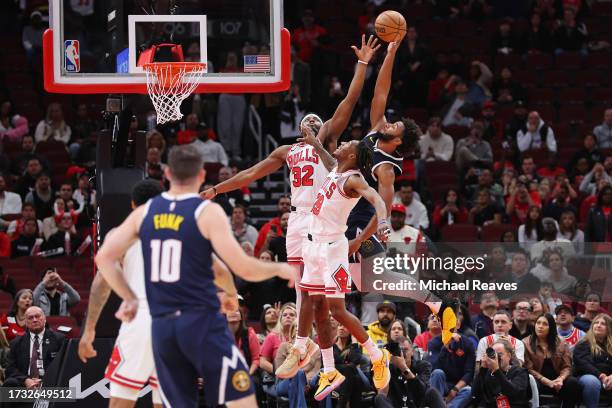 Braxton Key of the Denver Nuggets tips-in a lob pass as time expires to tie the game against the Chicago Bulls at the United Center on October 12,...