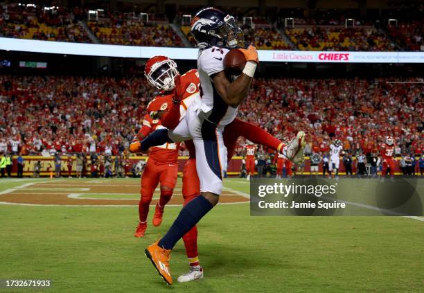 Courtland Sutton of the Denver Broncos catches a touchdown against the Kansas City Chiefs during the fourth quarter at GEHA Field at Arrowhead...