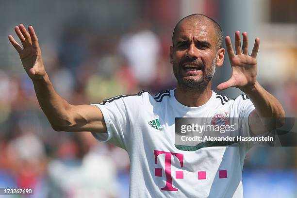 Josep Guardiola, head coach of FC Bayern Muenchen gesture during a training session at Campo Sportivo on July 11, 2013 in Arco, Italy