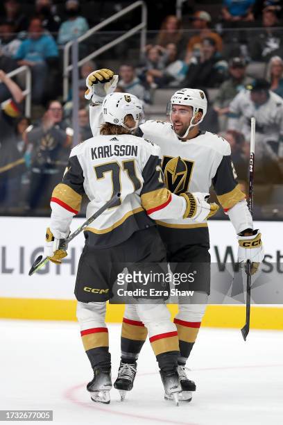 Michael Amadio of the Vegas Golden Knights is congratulated by William Karlsson after he scored against the San Jose Sharks in the first period at...