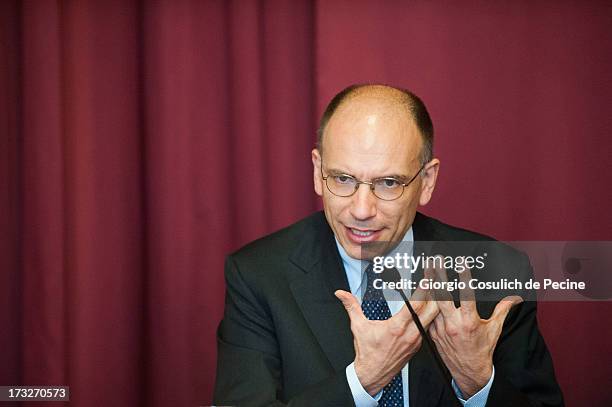 Italian Prime Minister Enrico Letta gestures as he attends the presentation of the book 'Un economista eclettico. Distribuzione, tecnologie e...