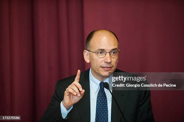 Italian Prime Minister Enrico Letta gestures as he attends the presentation of the book 'Un economista eclettico. Distribuzione, tecnologie e...