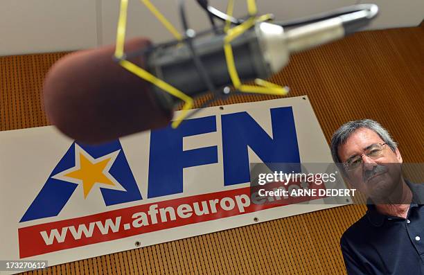 Gary Bautell, director of American Forces Network Europe poses in a studio of the broadcast network in Wiesbaden-Erbenheim, Germany on July 11, 2013....