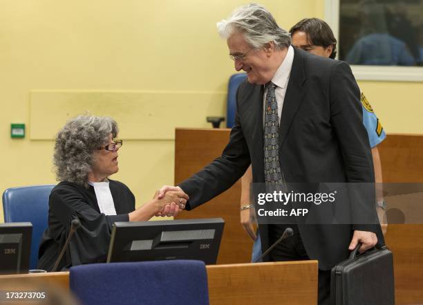 Bosnian Serb wartime leader Radovan Karadzic appears in the courtroom for his appeals judgement at the International Criminal Tribunal for Former...