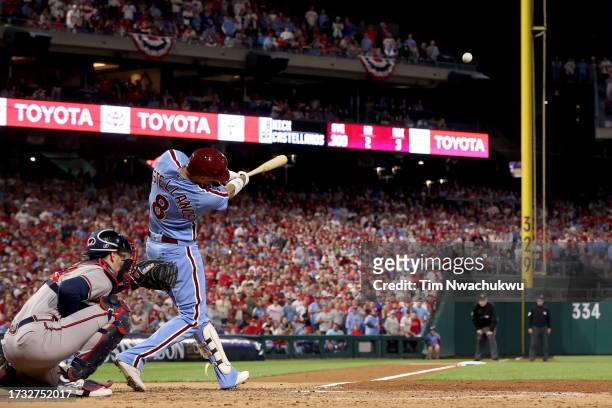 Nick Castellanos of the Philadelphia Phillies hits a home run in the fourth inning against the Atlanta Braves during Game Four of the Division Series...