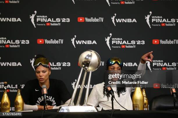 October 18: Alysha Clark of the Las Vegas Aces and A'ja Wilson of the Las Vegas Aces speak during a press conference after winning Game 4 of the 2023...