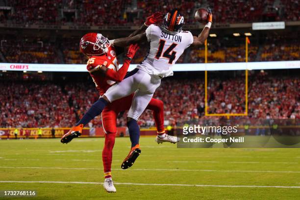 Courtland Sutton of the Denver Broncos catches a touchdown pass against the Kansas City Chiefs at GEHA Field at Arrowhead Stadium on October 12, 2023...
