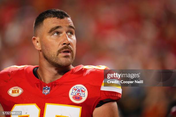 Travis Kelce of the Kansas City Chiefs looks on before kickoff against the Denver Broncos at GEHA Field at Arrowhead Stadium on October 12, 2023 in...