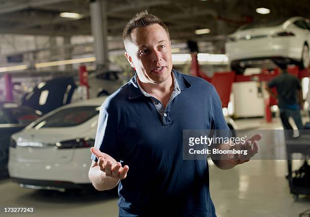Elon Musk, co-founder and chief executive officer of Tesla Motors Inc., speaks during an interview at the company's assembly plant in Fremont,...
