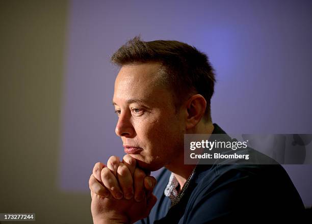 Elon Musk, co-founder and chief executive officer of Tesla Motors Inc., pauses during an interview at the company's assembly plant in Fremont,...