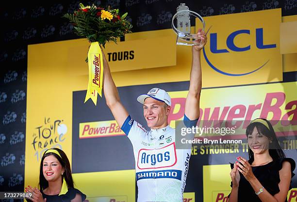 Marcel Kittel of Germany and team Argos-Shimano celebrates on the podium after winning stage twelve of the 2013 Tour de France, a 218KM road stage...