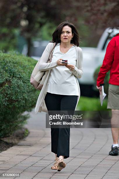 Sheryl Sandberg, chief operating officer of Facebook Inc., arrives for a morning session during the Allen & Co. Media and Technology Conference in...