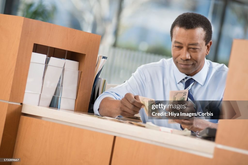 Counting Employee Bank Employee Counting Money High-Res Stock Photo - Getty Images