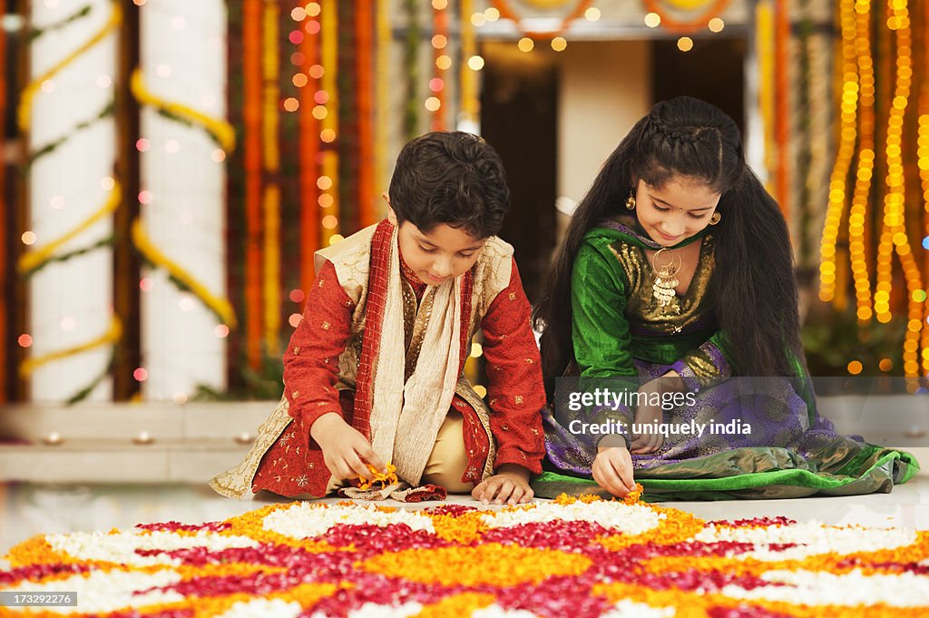 Children making rangoli on Diwali